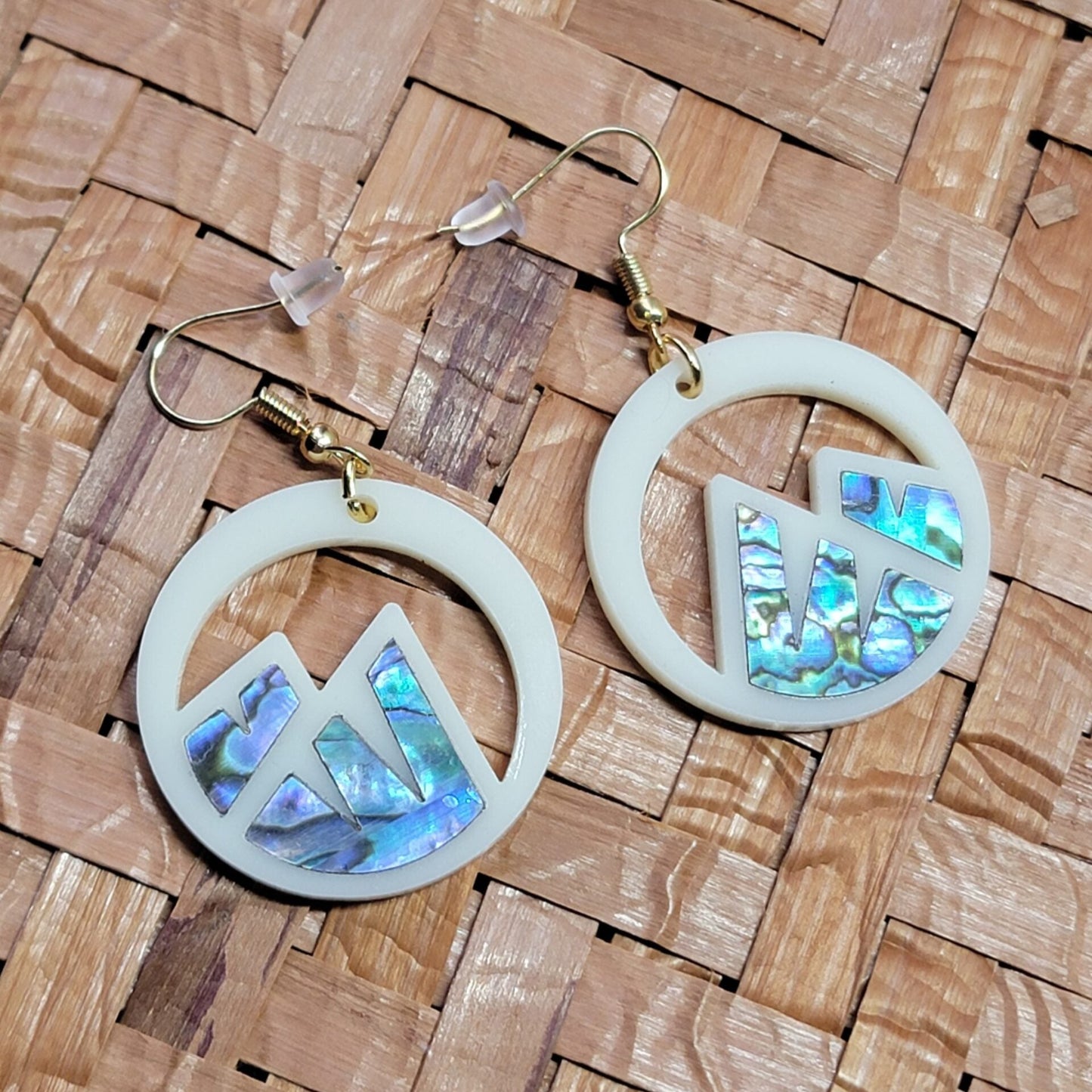 ivory acrylic earring with mountain cut out and abalone inlay from copper canoe woman