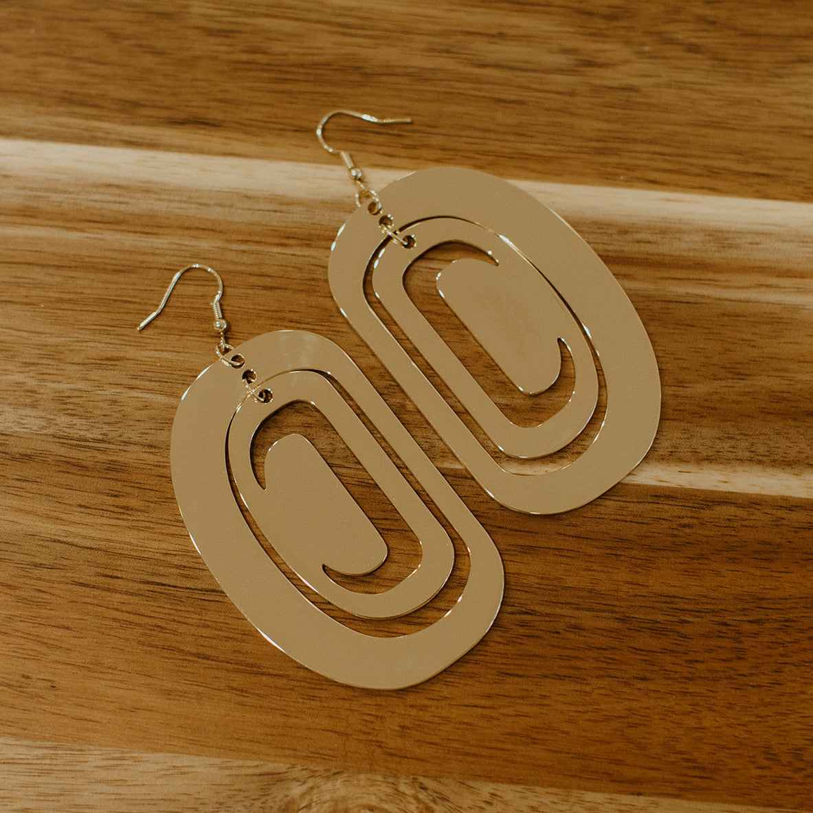 14k gold luxury formline indigenous statement earring with hooks.