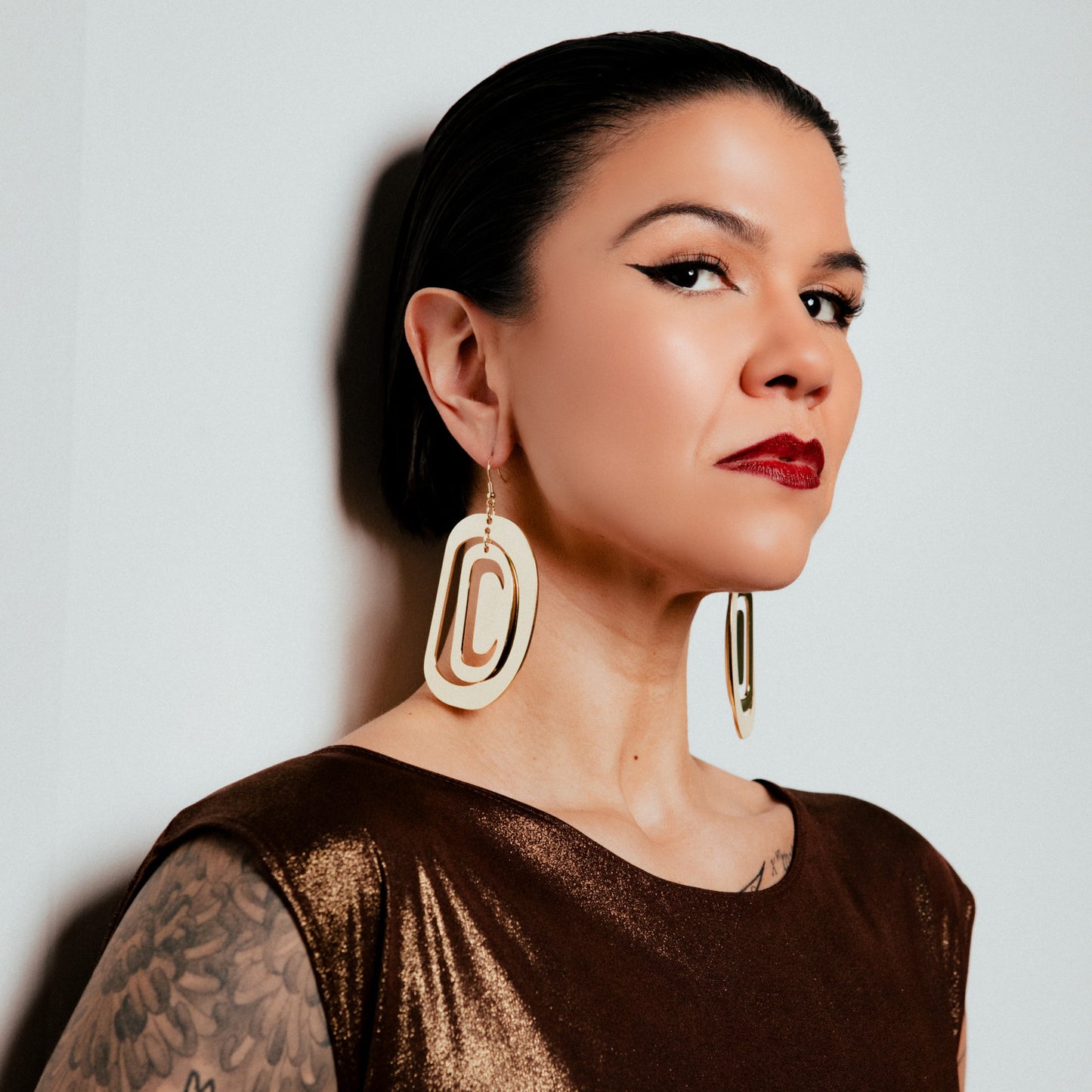 14k gold luxury formline indigenous statement earring.