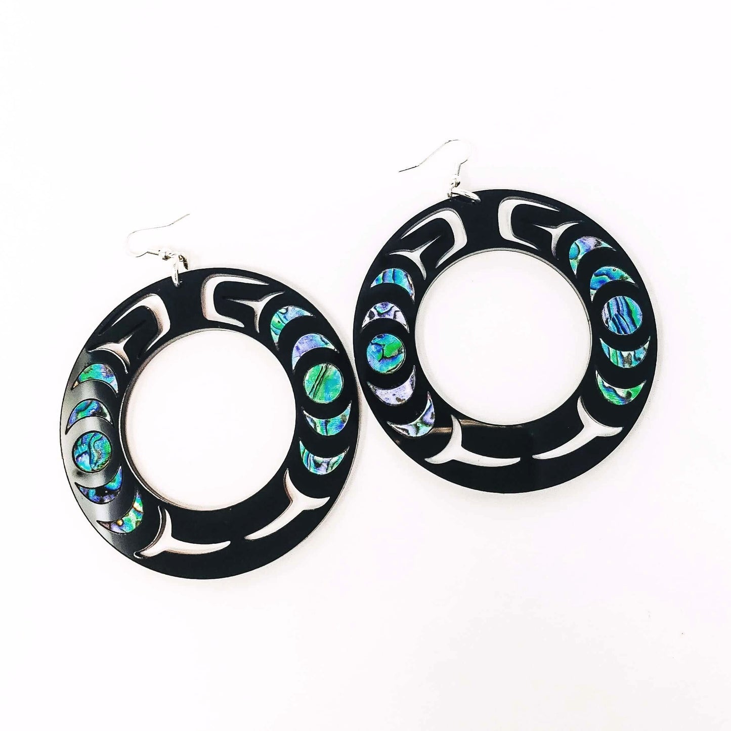 Nala Hoop earring from Copper Canoe Woman in black acrylic with abalone inlay.